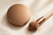Mossicare Cream Bronzer — closed compact with bronzer brush